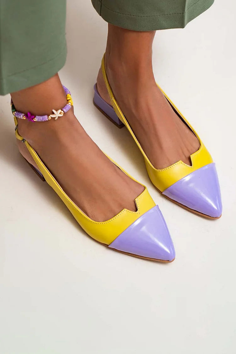 VITTORIA | Elegant ballet flats with toe cap and two-tone details for a refined style.